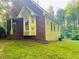 Ranch style home with brick and vinyl siding and well-maintained landscaping, offering a serene and spacious yard at 3550 Gravitt Rd, Cumming, GA 30040