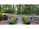 The front yard and landscaping provide a welcoming entrance at 3550 Gravitt Rd, Cumming, GA 30040