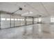 Spacious garage with multiple doors and windows for natural light, perfect for storage or a workshop at 3550 Gravitt Rd, Cumming, GA 30040