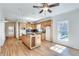 Bright, spacious kitchen with a center island, modern appliances, and hardwood floors at 3550 Gravitt Rd, Cumming, GA 30040