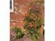 Picturesque landscaping with colorful flowers near brick home at 3550 Gravitt Rd, Cumming, GA 30040