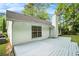 Backyard featuring a wooden deck, ideal for outdoor relaxation and entertainment in the outdoors at 5936 Old Wellborn Trce, Lithonia, GA 30058