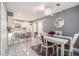 A spacious kitchen and dining area with modern appliances and stylish furnishings enhance the living space at 5936 Old Wellborn Trce, Lithonia, GA 30058