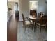 Open dining room with hardwood floors and elegant furnishings at 398 Kyles Cir, Hiram, GA 30141