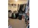 Walk-in closet with shelving, clothing racks, and carpet flooring at 398 Kyles Cir, Hiram, GA 30141