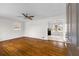 Inviting living room boasting gleaming hardwood floors and fresh, neutral paint at 2852 Crabapple Lane, Dacula, GA 30019
