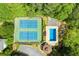 Aerial view of community amenities featuring tennis courts and swimming pool at 4441 Langdon Se Walk, Smyrna, GA 30080