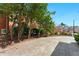 Long driveway leading to neighborhood houses, surrounded by mature trees at 4441 Langdon Se Walk, Smyrna, GA 30080