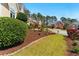 Beautiful house with a landscaped front yard in a well-maintained neighborhood at 4441 Langdon Se Walk, Smyrna, GA 30080