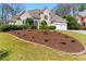 Stunning two-story house with a well-maintained lawn, complemented by a two-car garage at 4441 Langdon Se Walk, Smyrna, GA 30080