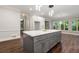 Spacious kitchen island with seating and storage, set in a bright, open-concept kitchen area at 4441 Langdon Se Walk, Smyrna, GA 30080