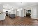 Spacious kitchen area with a large island, stainless steel appliances, and hardwood floors at 4441 Langdon Se Walk, Smyrna, GA 30080
