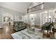 Bright open floor plan featuring hardwood floors, and modern gray paint and decor at 4441 Langdon Se Walk, Smyrna, GA 30080