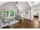 Expansive living room with hardwood floors, large windows, and open layout at 4441 Langdon Se Walk, Smyrna, GA 30080