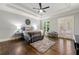 Serene main bedroom with trey ceiling, hardwood floors, and french doors to private balcony at 4441 Langdon Se Walk, Smyrna, GA 30080