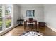 Bright home office with hardwood floors, a large window, and a classic desk setup at 4441 Langdon Se Walk, Smyrna, GA 30080