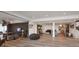 Expansive finished basement with luxury vinyl plank flooring, offering versatile living and entertainment spaces at 1025 Abingdon Ln, Johns Creek, GA 30022