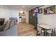 Finished basement with a wet bar, lounge area, and a built in basketball hoop game at 1025 Abingdon Ln, Johns Creek, GA 30022