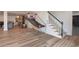 This basement features luxury vinyl plank flooring and a basketball hoop, great for recreational activities at 1025 Abingdon Ln, Johns Creek, GA 30022