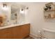 Well-lit bathroom featuring modern vanity, stylish decor, and neutral color palette at 1025 Abingdon Ln, Johns Creek, GA 30022