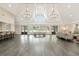Spacious community room with soaring ceilings, modern lighting and dining area, perfect for gatherings and events at 1025 Abingdon Ln, Johns Creek, GA 30022