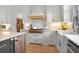 Bright kitchen featuring stainless appliances, a center island, and plenty of cabinets at 1025 Abingdon Ln, Johns Creek, GA 30022
