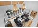 Aerial view of a living room featuring high ceilings, a fireplace, and comfortable seating at 1025 Abingdon Ln, Johns Creek, GA 30022