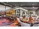 Elegant restaurant setting with tables, chairs and sports memorabilia creating a welcoming atmosphere at 1025 Abingdon Ln, Johns Creek, GA 30022