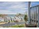 Balcony view showcasing townhomes, lake views, and parking for convenient and scenic living at 2300 Habersham Marina Rd # 201, Cumming, GA 30041