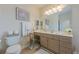 Well-appointed bathroom with a vanity, ample counter space, and elegant fixtures at 2300 Habersham Marina Rd # 201, Cumming, GA 30041