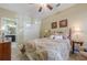 Inviting bedroom with neutral tones, a walk-in closet, and an ensuite bathroom, ensuring comfort and privacy at 2300 Habersham Marina Rd # 201, Cumming, GA 30041