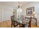 Charming dining area with hardwood floors and views of entry for convenient living and entertaining at 2300 Habersham Marina Rd # 201, Cumming, GA 30041