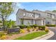 Charming gray townhome with well-manicured landscaping and visible street address for easy identification at 2300 Habersham Marina Rd # 201, Cumming, GA 30041