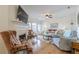 Comfortable living room with fireplace and a sliding glass door to outdoor patio at 2300 Habersham Marina Rd # 201, Cumming, GA 30041