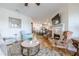 Living room featuring hardwood floors, fireplace, and open concept to eat-in kitchen at 2300 Habersham Marina Rd # 201, Cumming, GA 30041