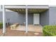 Outdoor patio with a small bench and a door for access at 2300 Habersham Marina Rd # 201, Cumming, GA 30041
