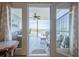 Open porch view with furniture and lake visible at 2300 Habersham Marina Rd # 201, Cumming, GA 30041