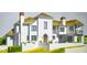 Elegant home showcasing a Spanish architectural style and charming landscaping at 295 Pebble Trl, Alpharetta, GA 30009