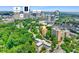 Aerial view showcases the property's prime location, surrounded by lush greenery, city amenities, and popular landmarks at 2965 Pharr Court South Nw # 102, Atlanta, GA 30305