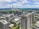 Gorgeous aerial view revealing the city skyline, showcasing the perfect mix of urban living at 2965 Pharr Court South Nw # 102, Atlanta, GA 30305