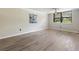 Bright room with modern fan and stylish floors, perfect for relaxing or entertaining at 2965 Pharr Court South Nw # 102, Atlanta, GA 30305