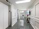 Inviting hallway with neutral tones, elegant wall accents, and access to elevators at 2965 Pharr Court South Nw # 102, Atlanta, GA 30305