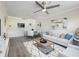 Bright living room with hardwood floors, neutral decor, and modern furnishings at 2965 Pharr Court South Nw # 102, Atlanta, GA 30305
