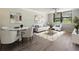 Bright living room featuring modern decor, neutral tones, and hardwood floors, perfect for relaxation and entertaining guests at 2965 Pharr Court South Nw # 102, Atlanta, GA 30305