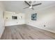 Bright, open living room with hardwood floors and stylish ceiling fan at 2965 Pharr Court South Nw # 102, Atlanta, GA 30305