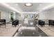 Spacious lobby with seating areas, elegant lighting, and stylish tile flooring at 2965 Pharr Court South Nw # 102, Atlanta, GA 30305