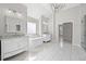 Luxurious bathroom featuring a soaking tub, double vanity, and stylish fixtures at 701 Cupcake Ct, Mcdonough, GA 30252