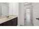 This bathroom features a modern vanity and bright lighting at 701 Cupcake Ct, Mcdonough, GA 30252