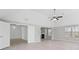 Bright bedroom featuring a ceiling fan, large window, and neutral color palette at 701 Cupcake Ct, Mcdonough, GA 30252
