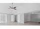 Spacious bedroom with high ceilings and a modern ceiling fan with light fixture at 701 Cupcake Ct, Mcdonough, GA 30252
